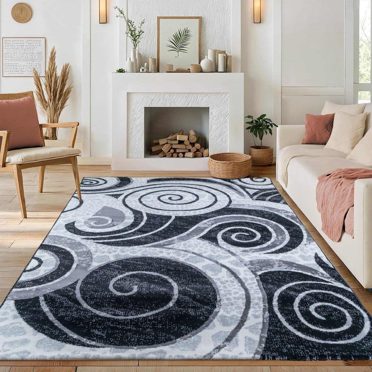 Premium Black Swirl Turkish area rug with jute backing, displayed in a stylish room setting with a fireplace, sofa, and furniture for a warm, elegant look