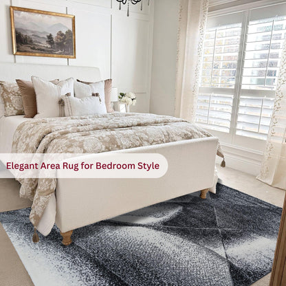Bedroom featuring the Black Cascade Turkish rug with a modern black and gray geometric pattern, placed beside a bed with neutral bedding for a bold yet cozy look
