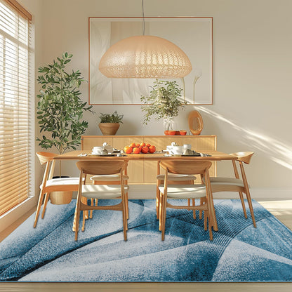 Dining room featuring the Blue Cascade Turkish rug with medium pile and geometric patterns, placed beneath a dining table to add a modern, stylish foundation with easy-care comfort