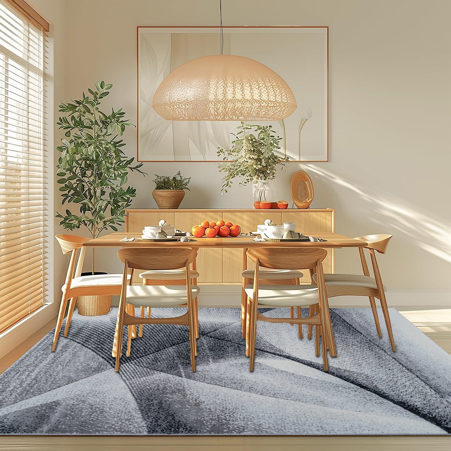 Dining room featuring the Gray Cascade Turkish rug with a geometric pattern, placed beneath a wooden dining table to add modern elegance and floor protection to the space