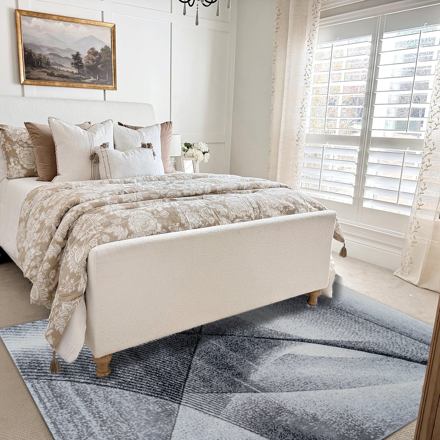 Bedroom styled with the Gray Cascade Turkish rug featuring a geometric abstract pattern, placed under a bed with neutral bedding to create a calm, modern atmosphere