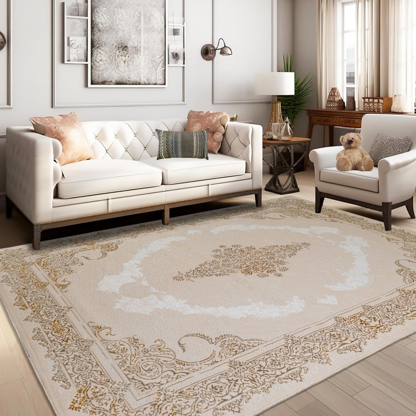 A sunlit ivory Turkish rug with beige and gold floral patterns placed in a living room with a sofa, adding warmth and elegance to modern home decor