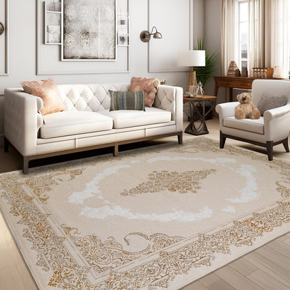 A sunlit ivory Turkish rug with beige and gold floral patterns placed in a living room with a sofa, adding warmth and elegance to modern home decor